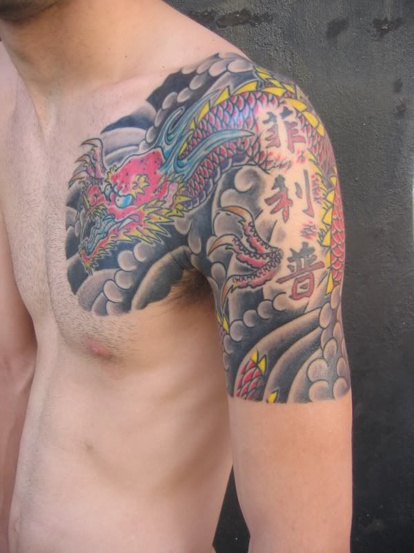 Fullcolor Dragon Tattoo in Left Man Arm