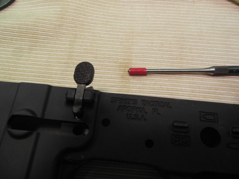 Bolt catch roll pin install made easier.