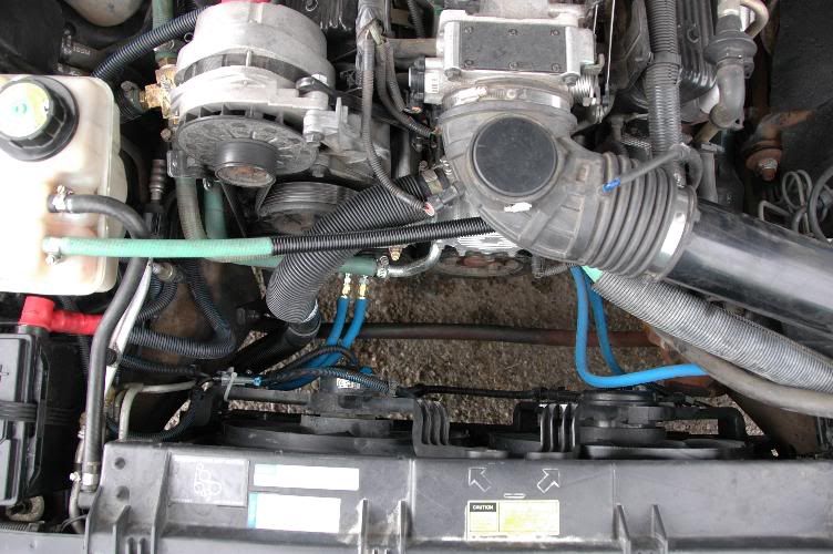 Replacing the leaking crimpon connectors for oil and trans cooler