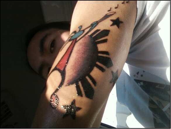 2nd tattoo,KOKOPELLI (ancient musician) with 3 STARS AND HALF SUN.